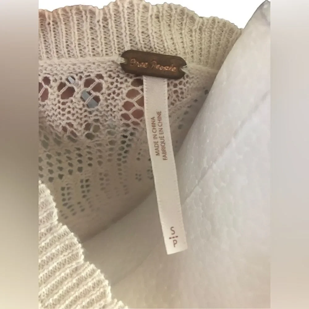 Free people crochet sleeve and shoulder top size small